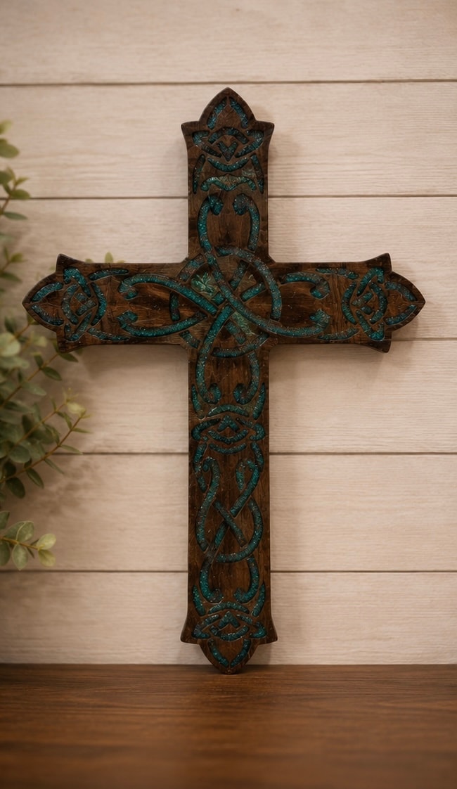 Ornate wooden cross with turquoise patina