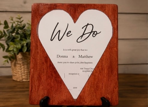 Wedding vow sign with wooden heart plaque