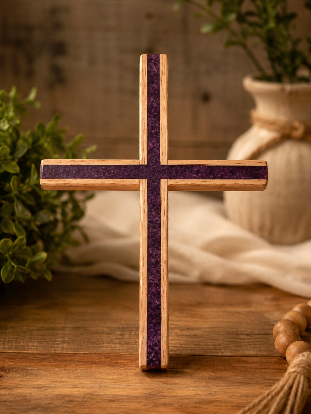 Wooden cross with purple inlay